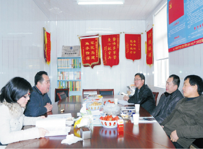 區(qū)教育局黨委委員、副局長甘力平一行視察我校